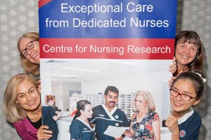 4 nurses posing with a Centre for Nursing Research banner