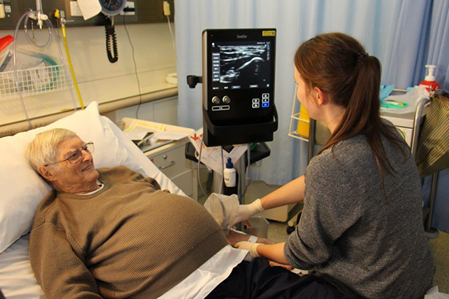 Patient receiving ultrasound guided cannula insertion