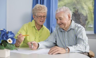 Occupational therapist and elderly man